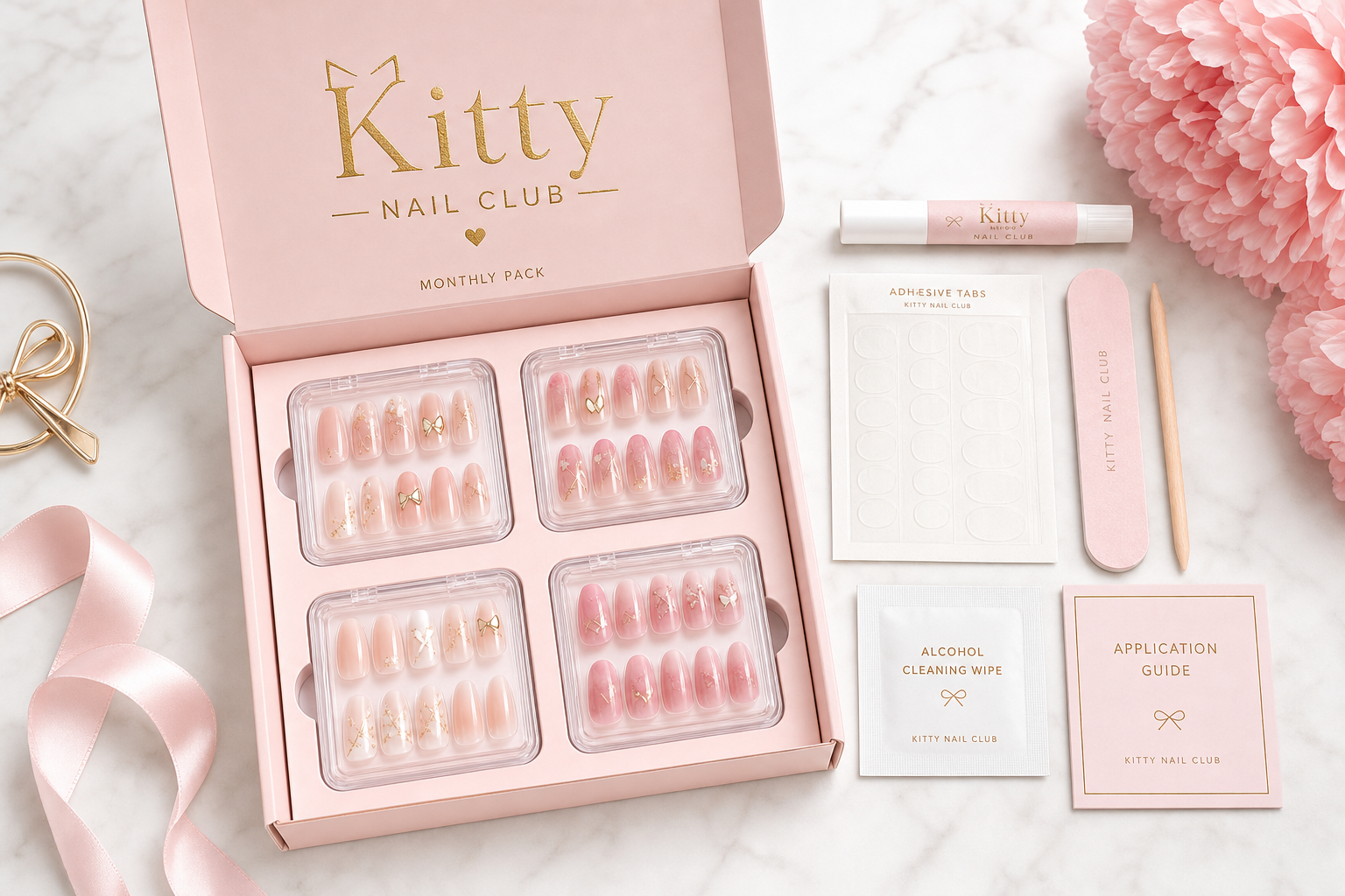 Kitty Box abierta con 4 sets de press-on, kit de aplicación y guía paso a paso